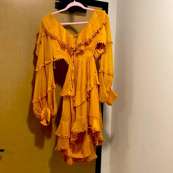 ASOS Dresses & Skirts - Beautiful mustard dress with tassel detailing and open cut style on sides